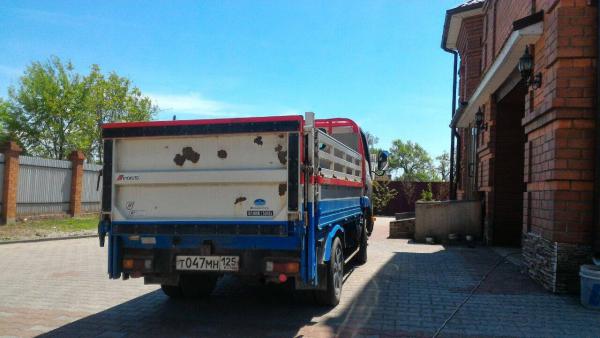 Заказать транспортировку грузовика стоимость из Уссурийска в Омск